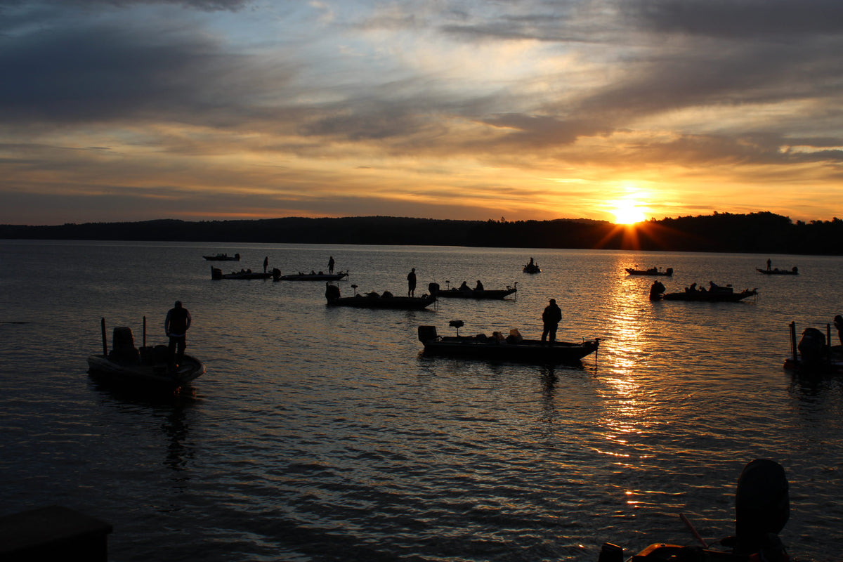 Bass tournament boats gathering at sunrise on the St. Lawrence River