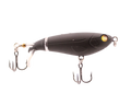 Black fishing lure with gold eye and treble hooks on a white background