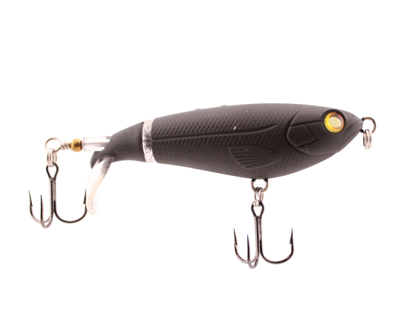 Black fishing lure with gold eye and treble hooks on a white background