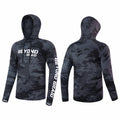 Camouflage hoodie with 'BEYOND BRAID' text on a white background