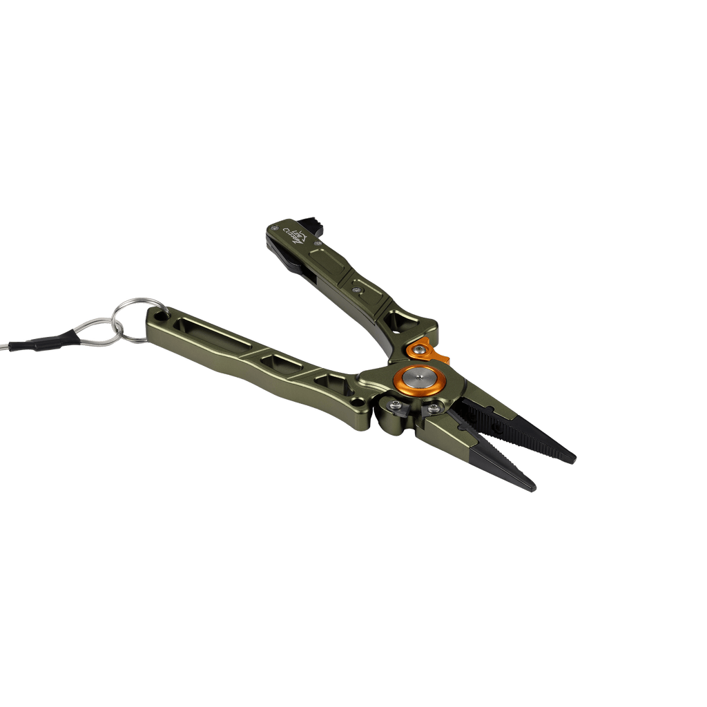 A pair of multi-tool pliers in olive green and black, featuring a central orange accent ring and a silver carabiner clip on the handle, shown against a solid green background.