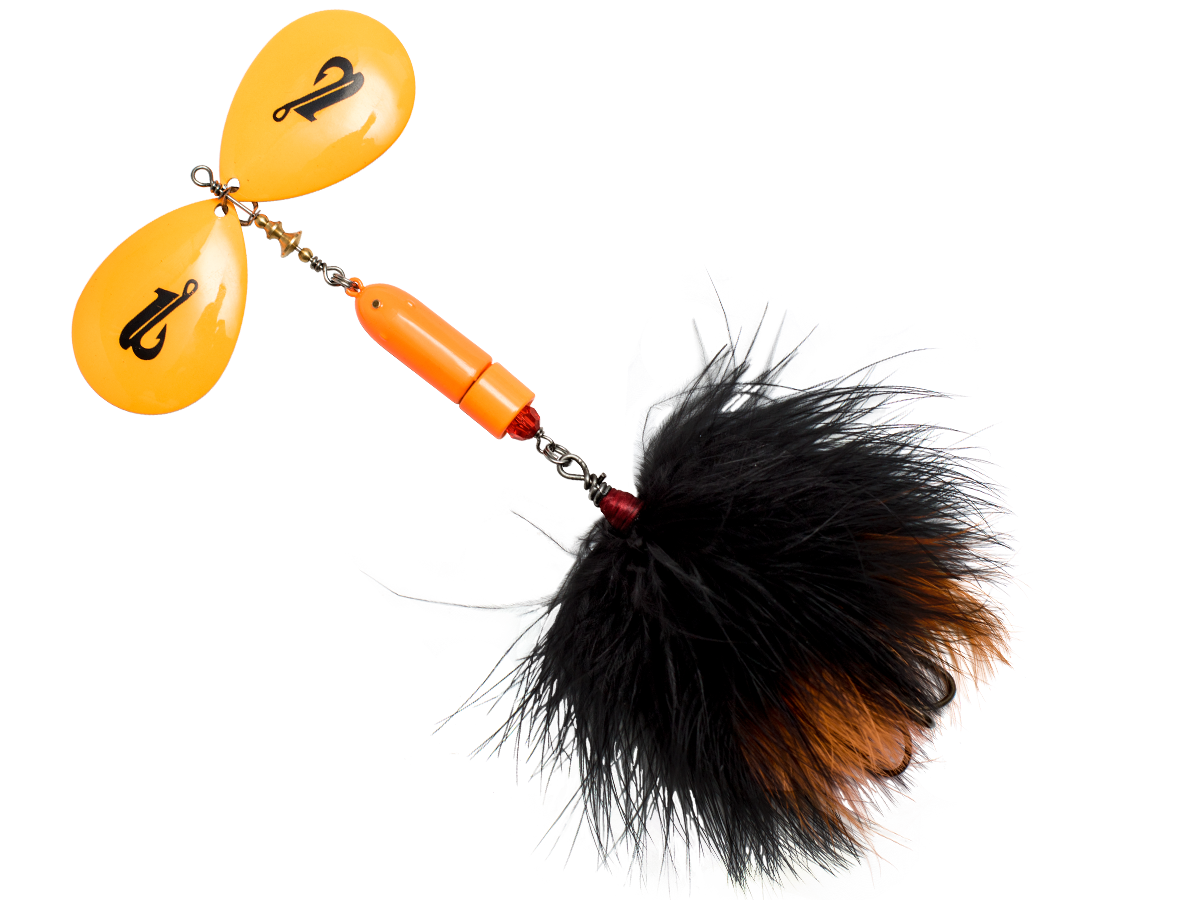 Buck Tail Fishing lure with orange blades, and body and black feather tail on a white background