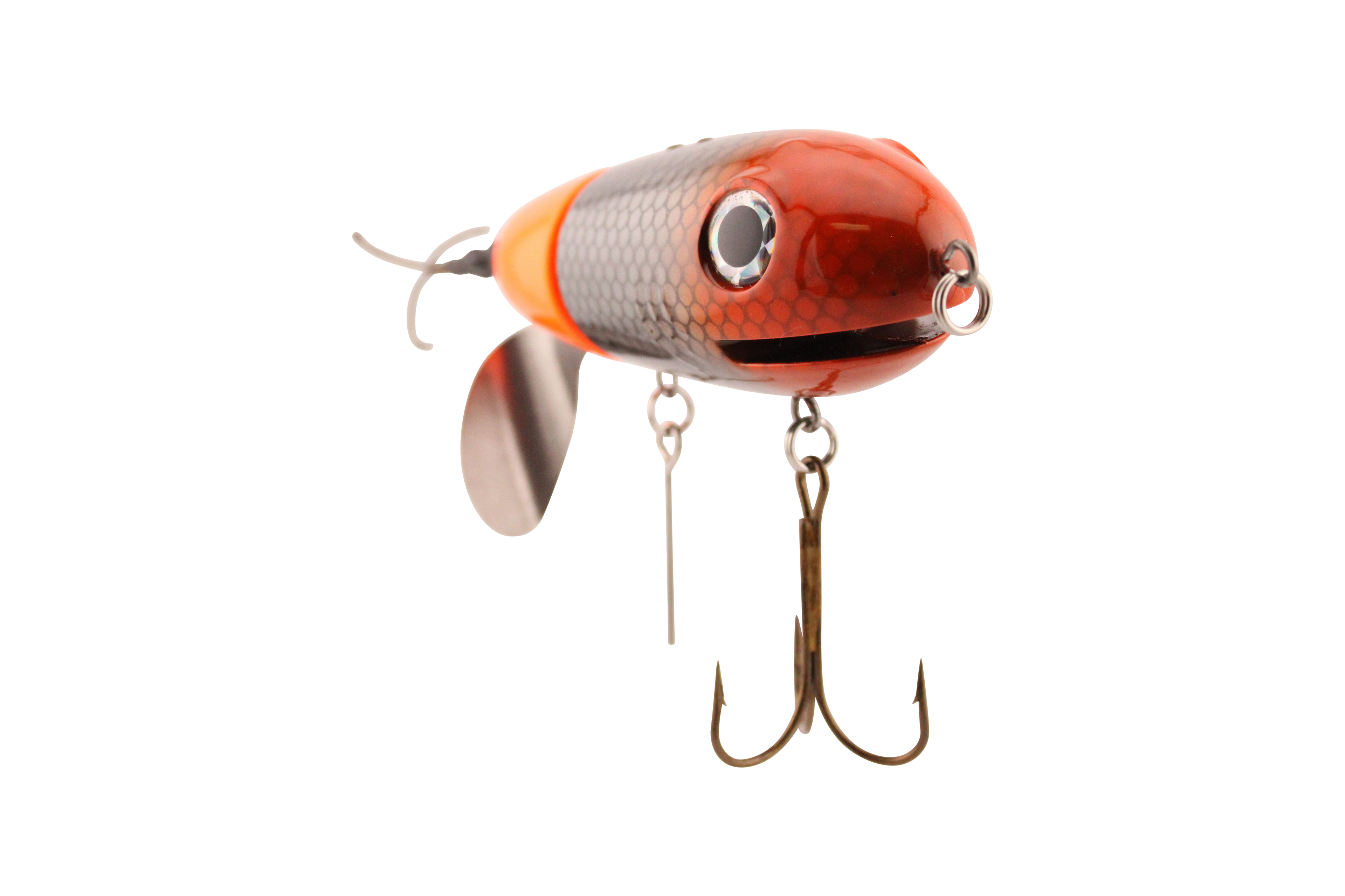 Fishing lure with orange and silver body on a white background