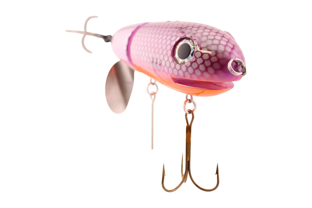 Pink fishing lure with a white background
