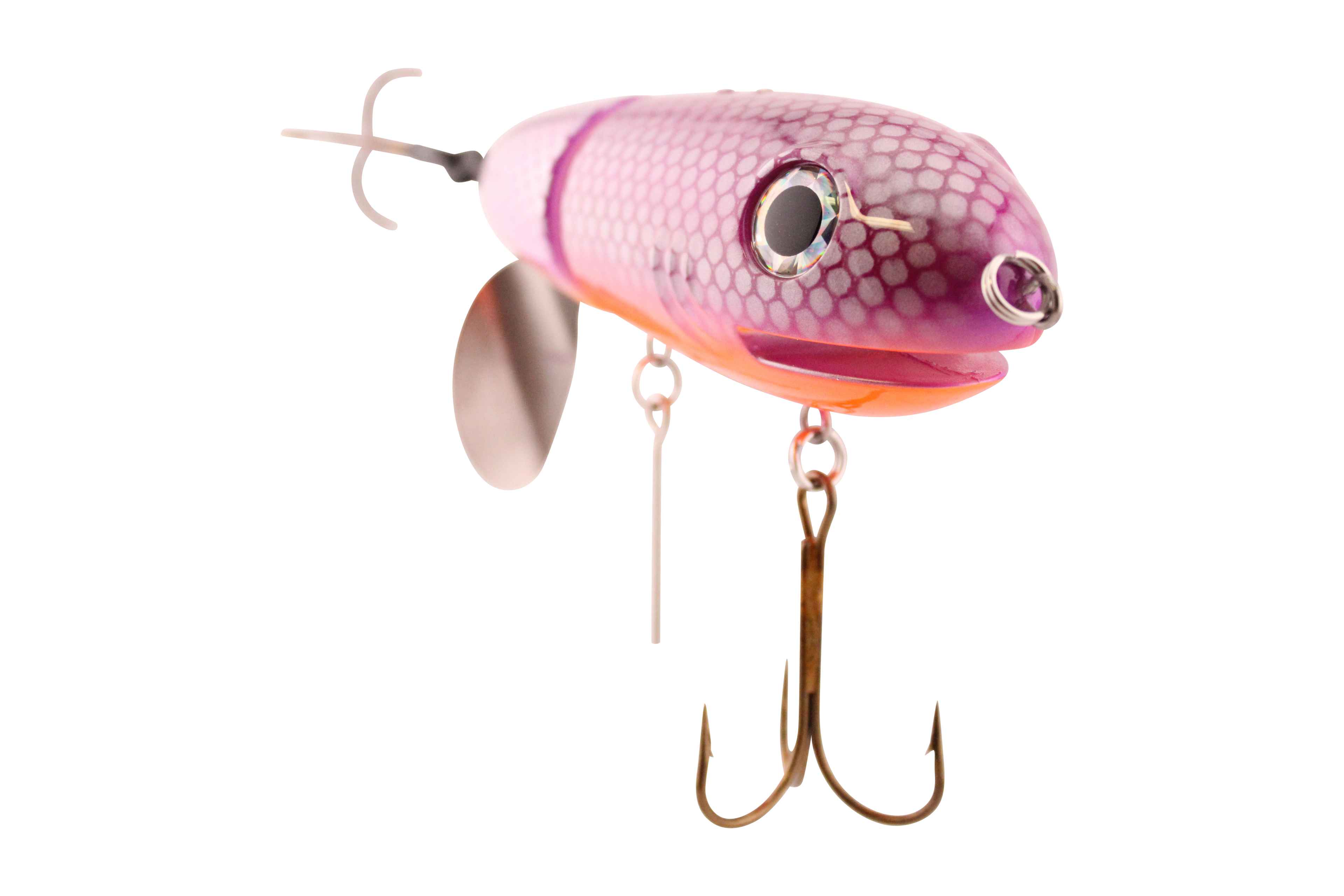 Pink fishing lure with a white background