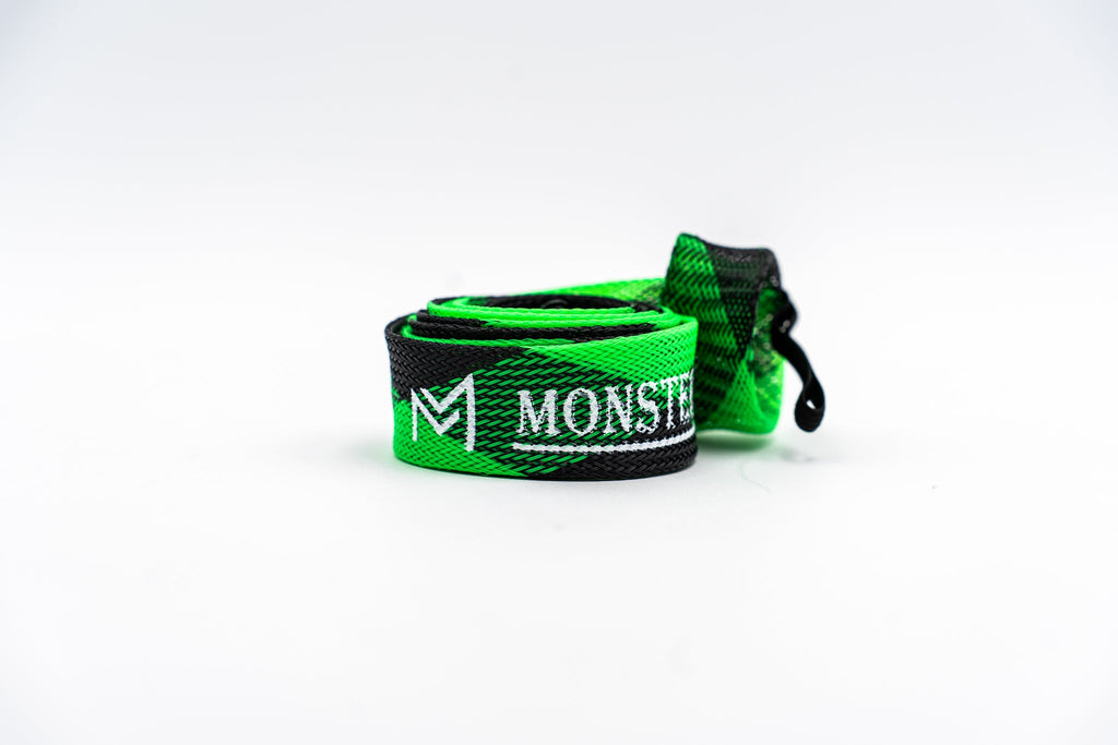 Green and black strap with 'MONSTER' branding on a white background