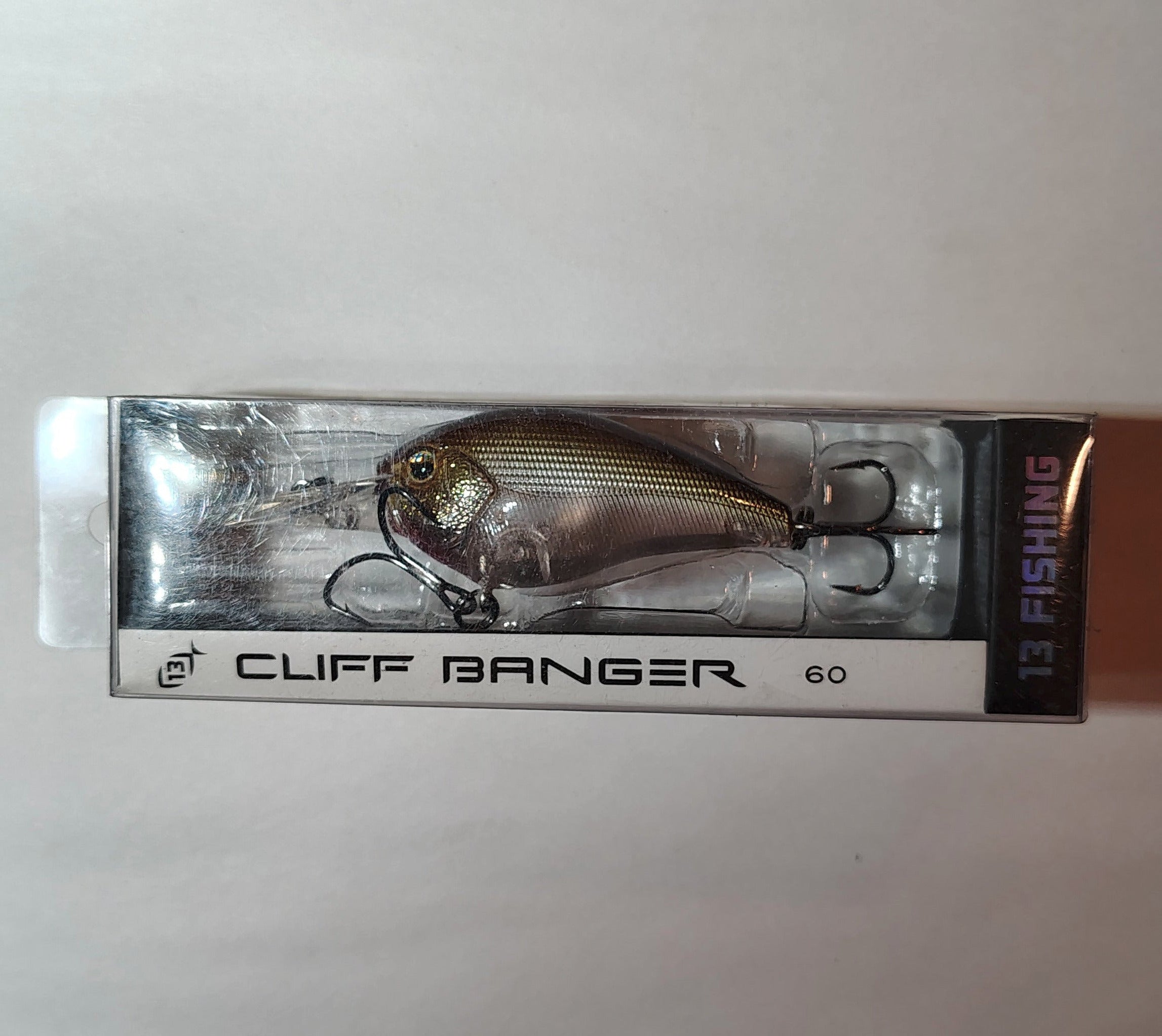Cliff Banger fishing lure packaging on a white background