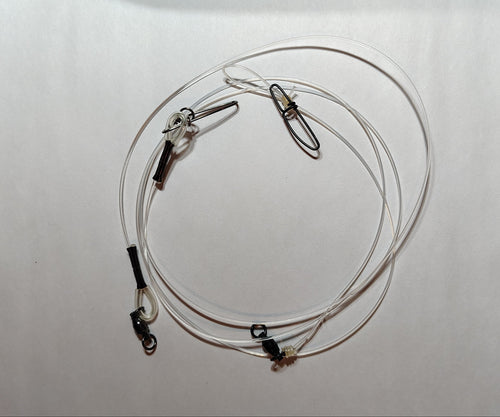 Coiled cable with clamps on a white background
