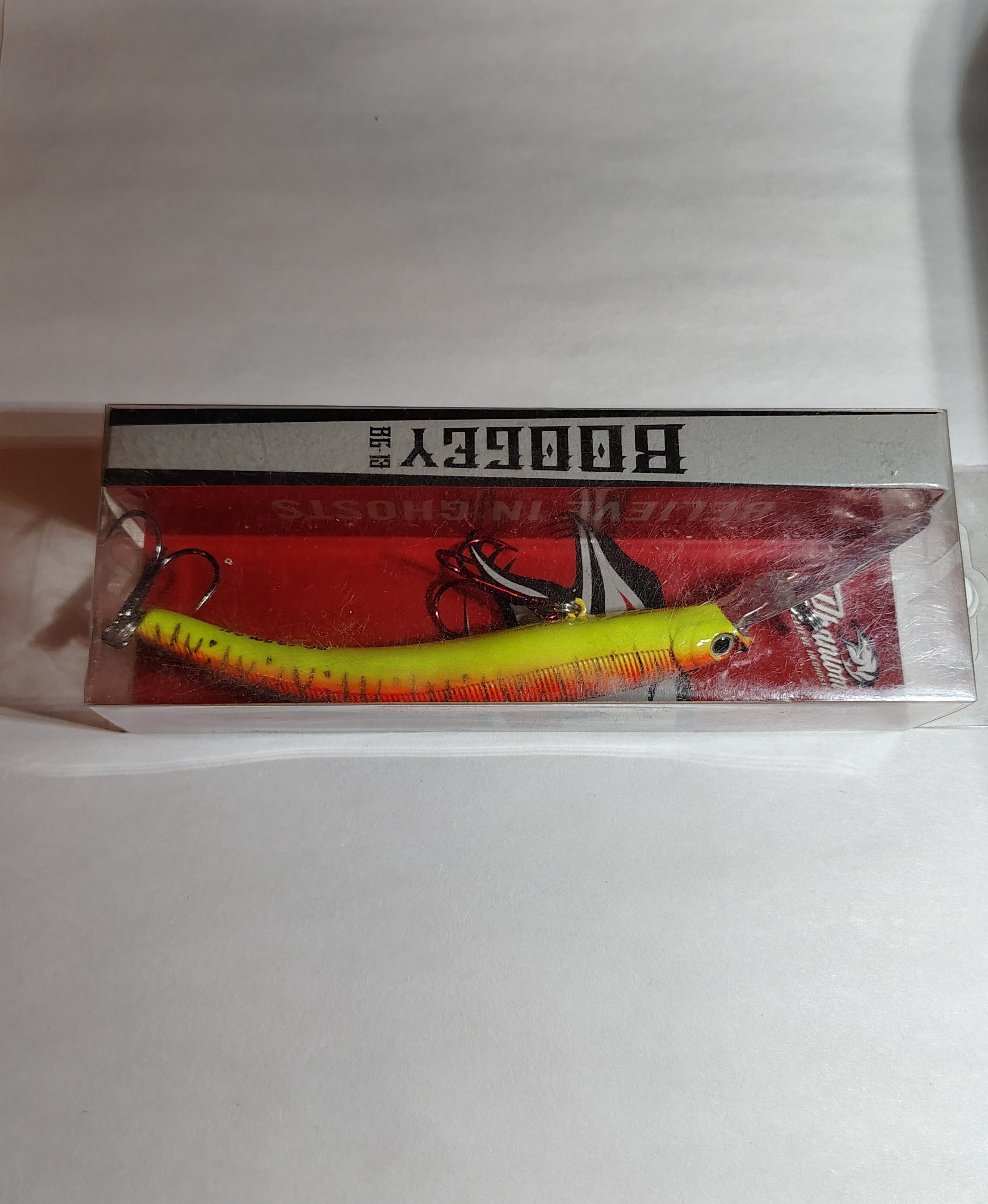 Fishing lure in a box with 'Boogey' branding on a white background