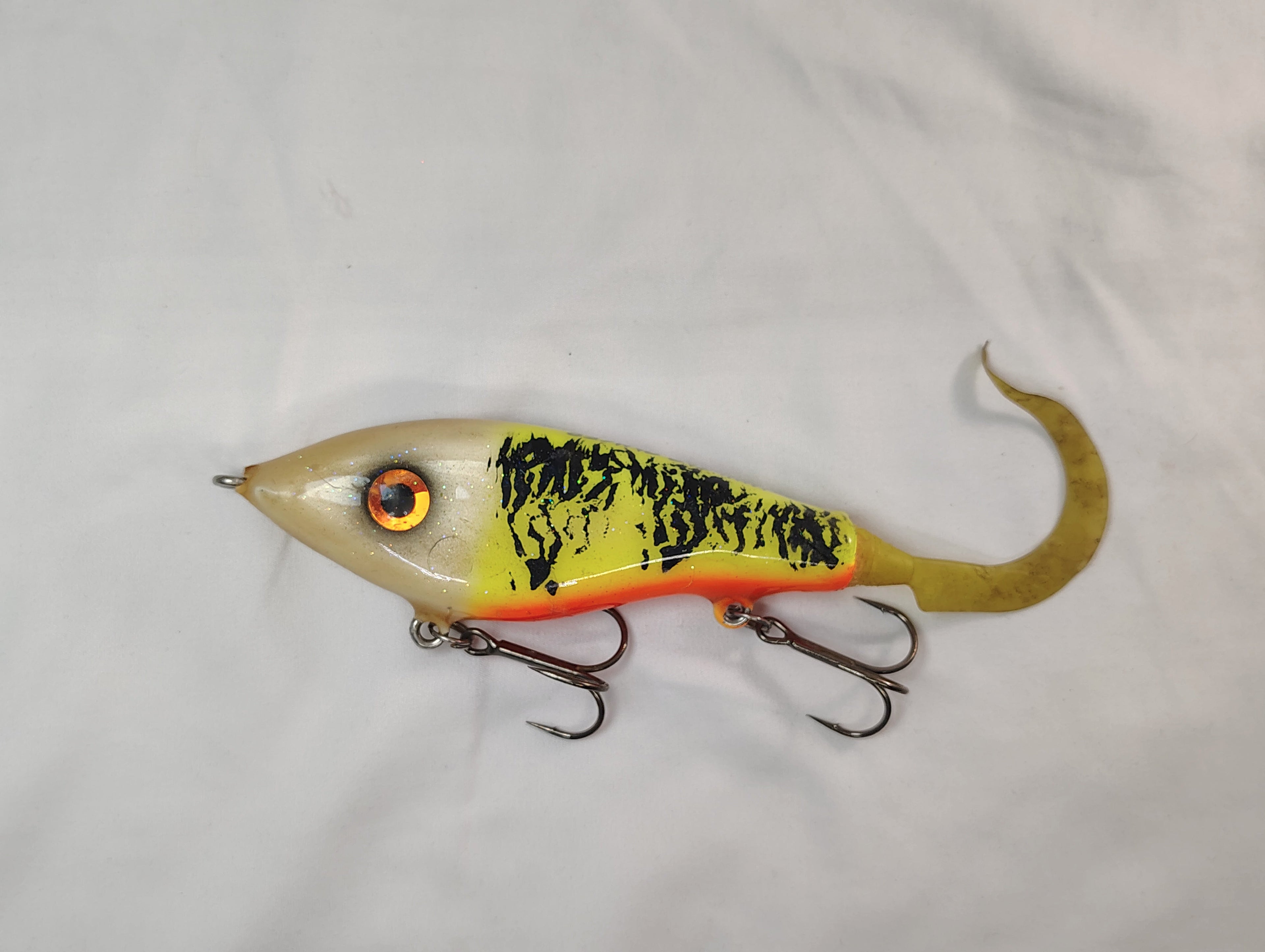 Fishing lure with a detailed design on a white background