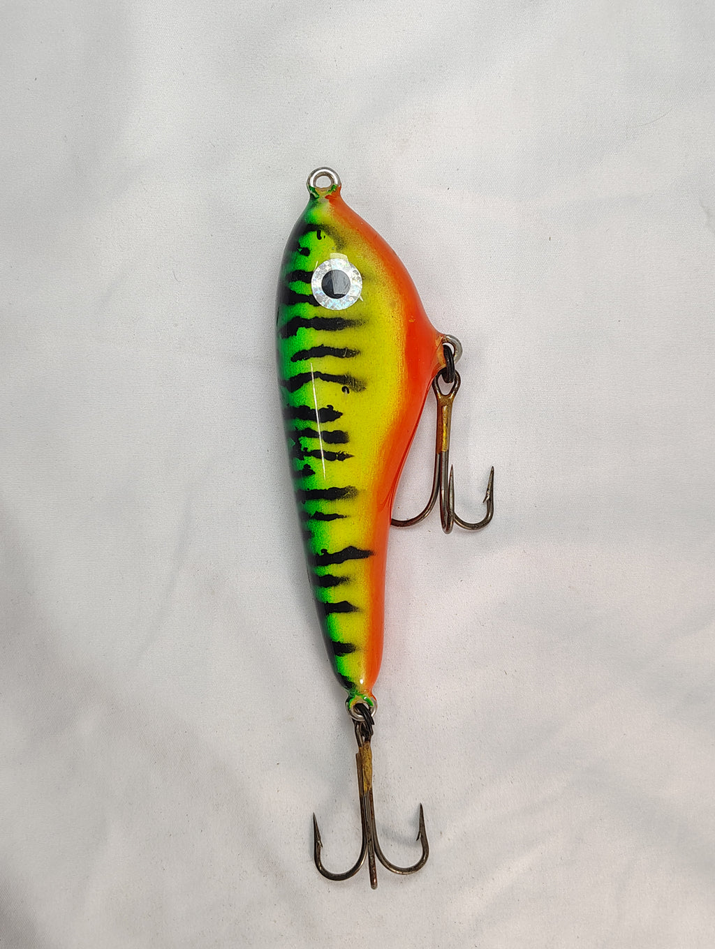 Colorful fishing lure on a white background