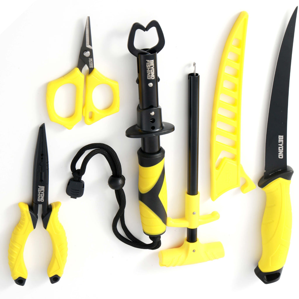 Set of yellow and black tools including scissors, pliers, and a knife on a white background