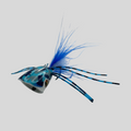 Blue and black fishing lure on a light gray background
