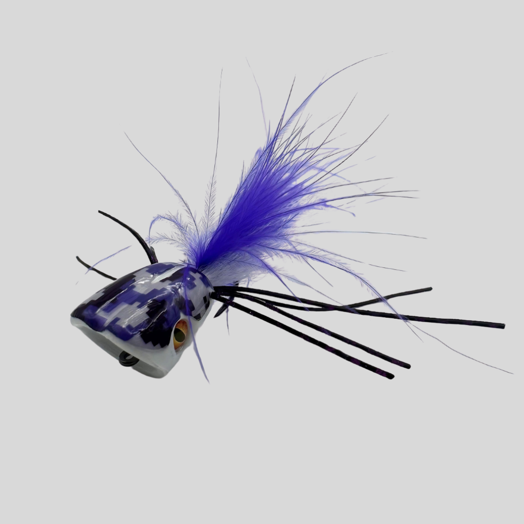 Fishing lure with blue and black details on a gray background