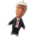 Figurine of a person wearing a suit and tie on a transparent background